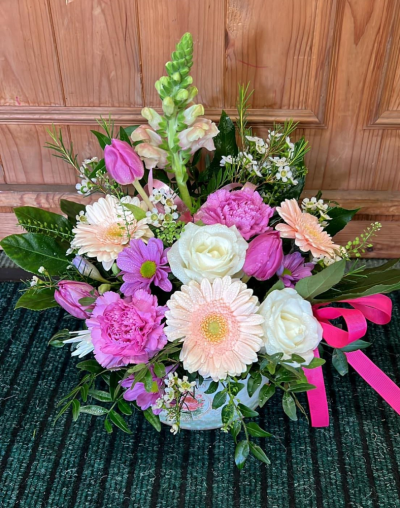 Cutesy in pinks - Petite pink arrangment in a stylish container - order this seasonal stunner today for deivery same day in Sowerby Bridge