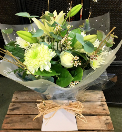 Pure Ivory - Glorious whites creams and ivory hand tied and teamed with stunning foliage - just perfect for that special someone - order for same day delivery in Sowerby Bridge